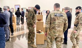 Росгвардейцы посетили выставку, приуроченную к 23-летию Конституции Чеченской Республики